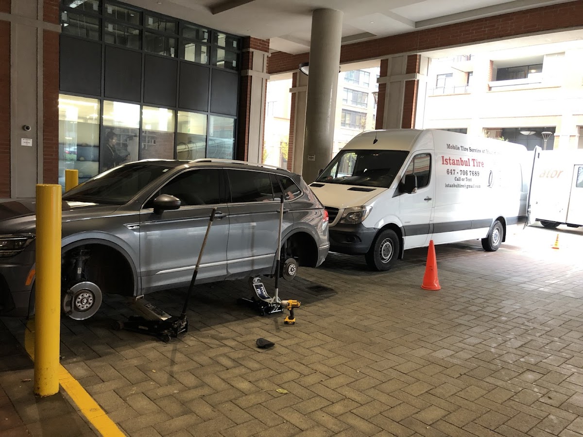 Mobile tire service at a covered building entrance